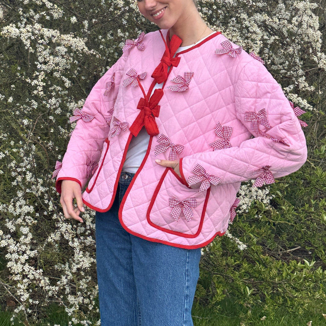 Veste matelassée avec broderie en forme de nœud